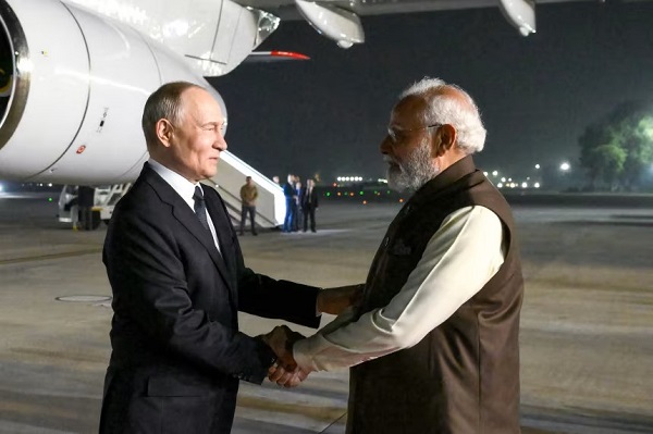 Modi greets Putin in India