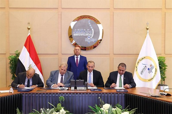 Wazir witnesses signing